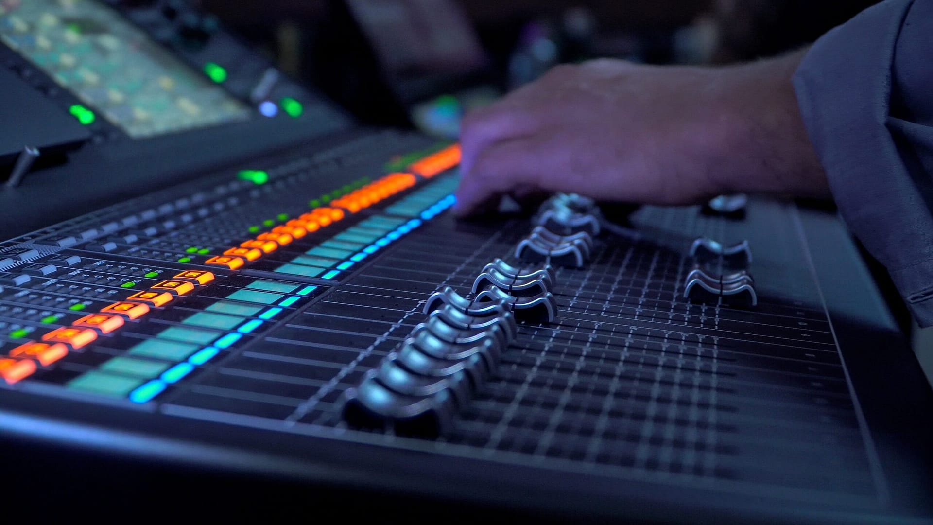 Person operating a digital mixer