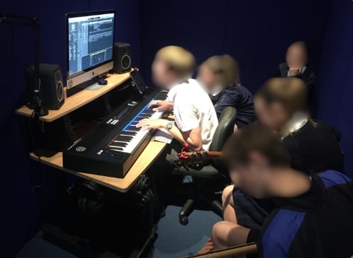 Individual practice rooms with instruments or computers for focused study.